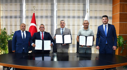 NKÜ İLE TAŞIYICILAR KOOPERATİFİ PROTOKOL İMZALADI